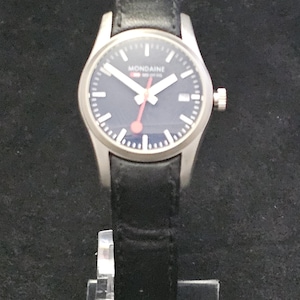 May include: A handmade wooden sign with the text "Welcome" in a whimsical font. The sign is painted white with a distressed finish, and features a small, decorative heart. It's designed for indoor or outdoor use.