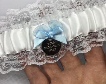 Personalised wedding garter, engraved charm, white, pale ivory or dark ivory with blue bow or blue with white bow