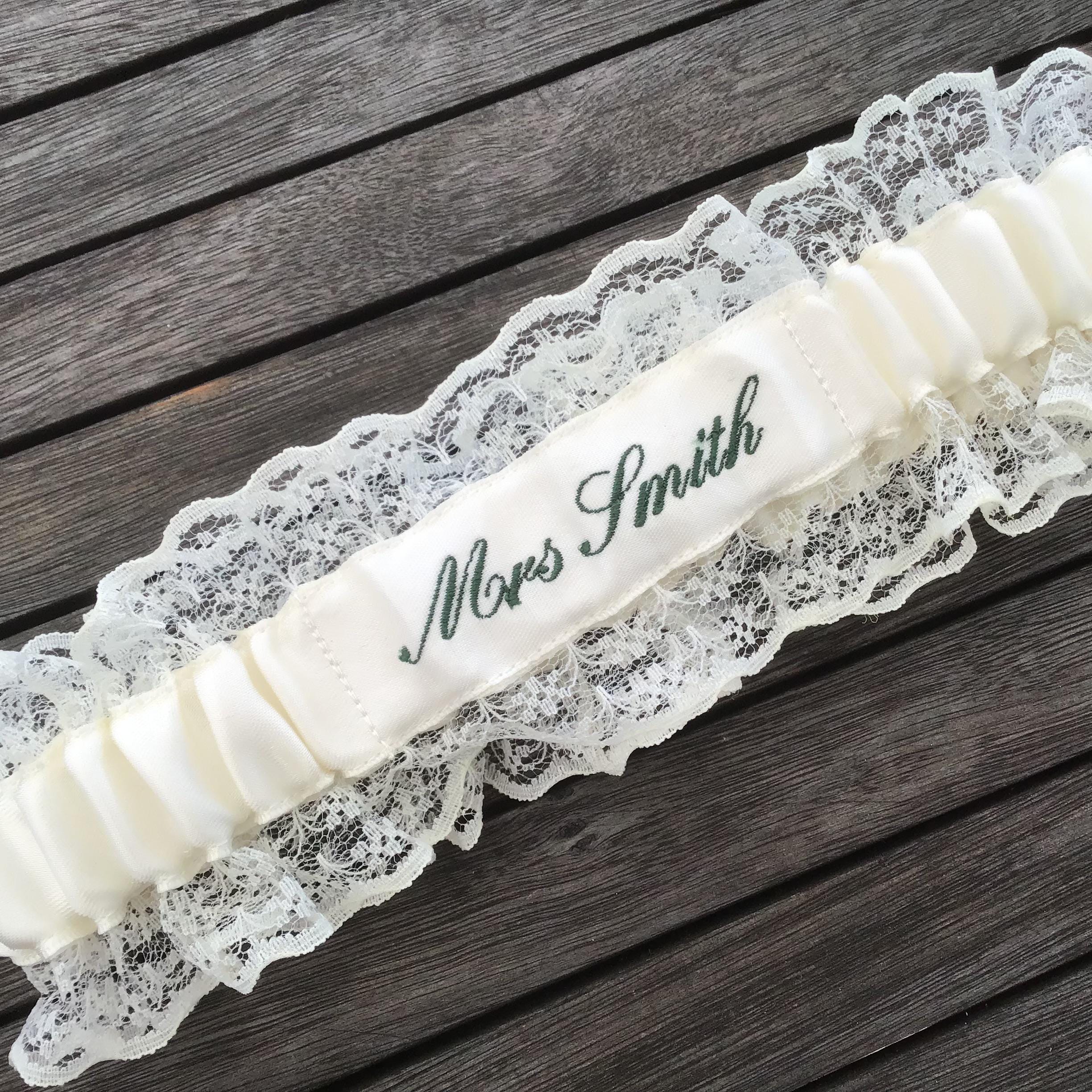 Embroidered personalised garter in white, bridal white or Ivory with a choice of embroidery thread colour.