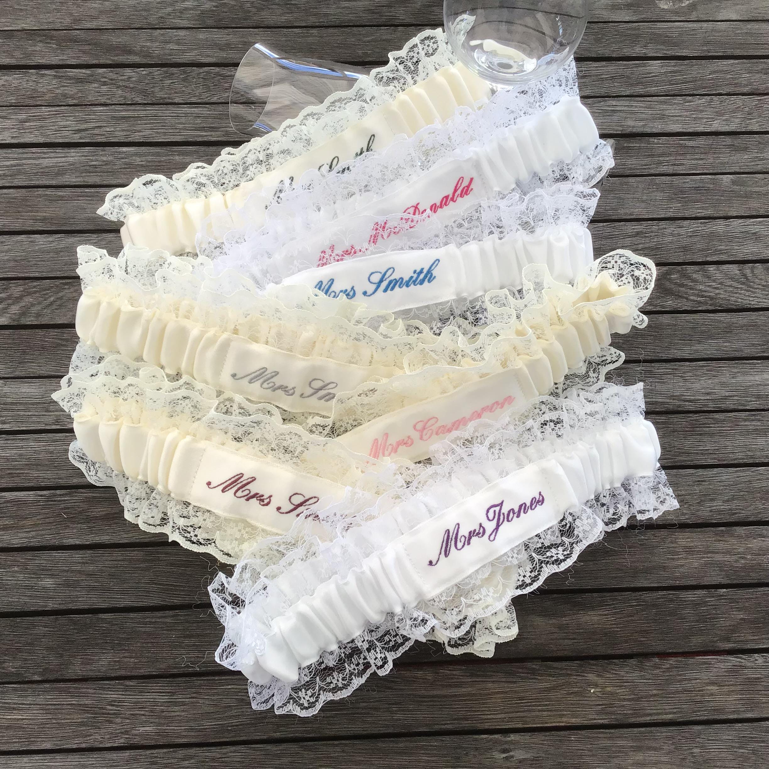 Embroidered personalised garter in white, bridal white or Ivory with a choice of embroidery thread colour.