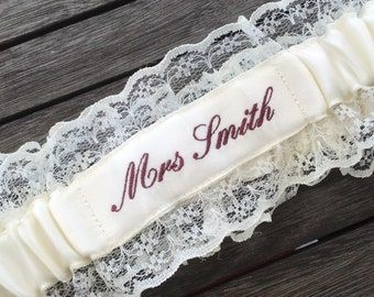 Embroidered personalised garter in white, bridal white or Ivory with a choice of embroidery thread colour