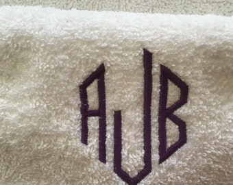 Monogramed white shaving towel, personalised with embroidered initials in a choice of colours.