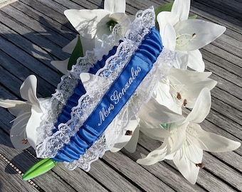 Embroidered personalised garter in royal blue with white lace and embroidery