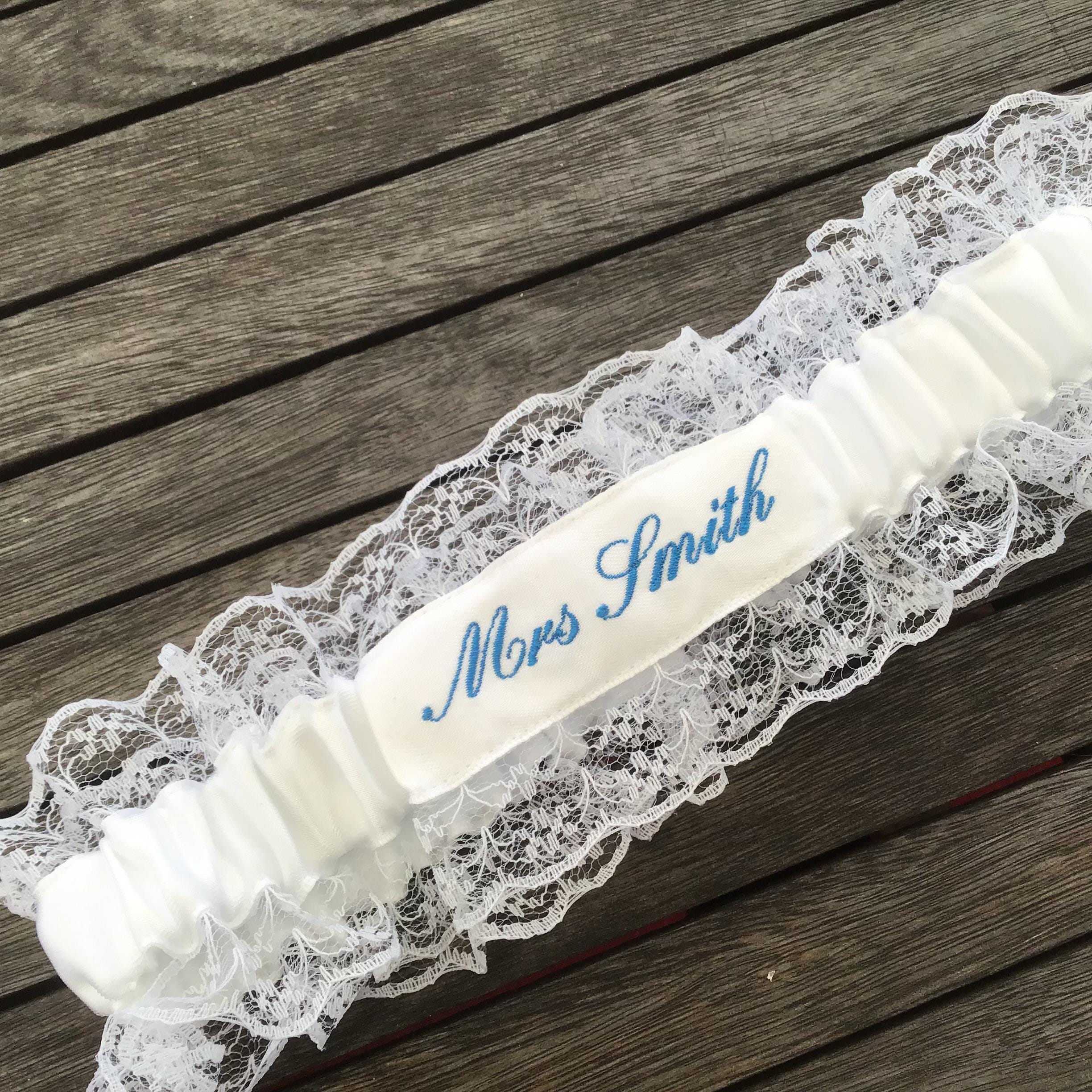 Embroidered personalised garter in white, bridal white or Ivory with a choice of embroidery thread colour.