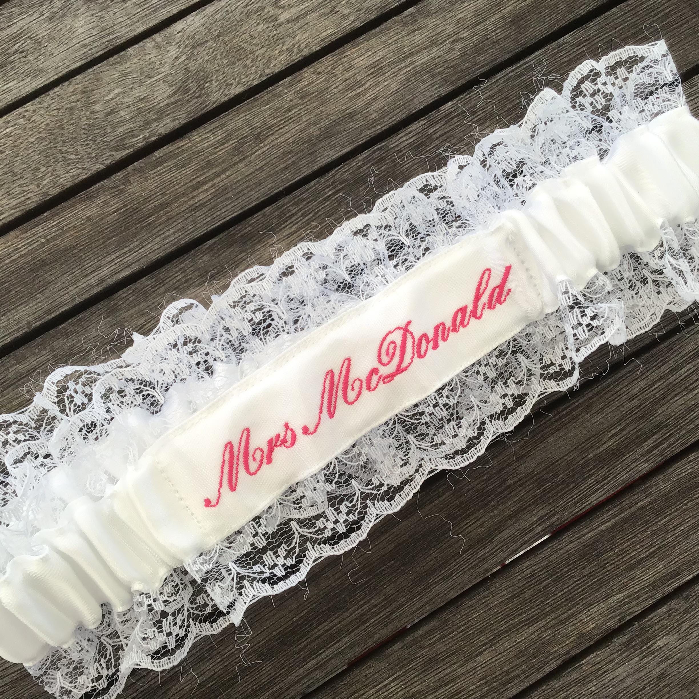 Embroidered personalised garter in white, bridal white or Ivory with a choice of embroidery thread colour.