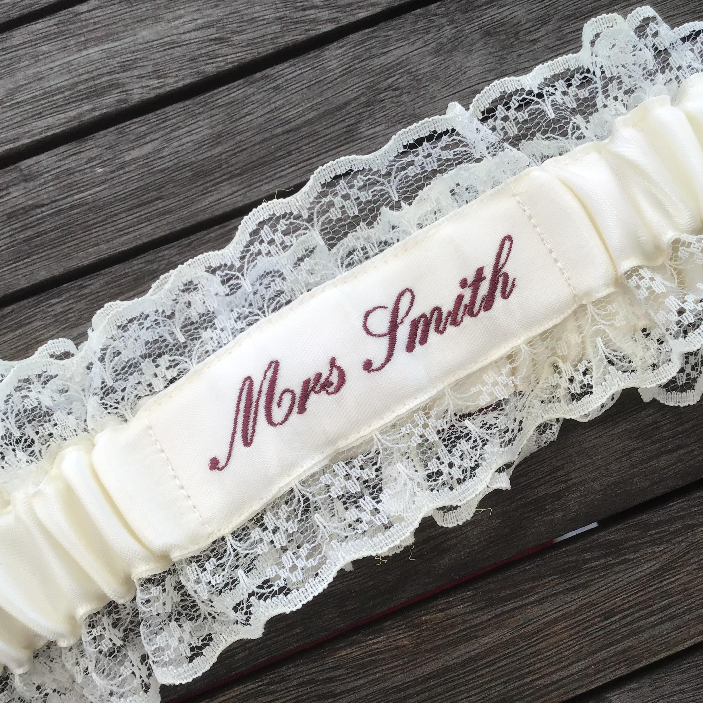 Embroidered personalised garter in white, bridal white or Ivory with a choice of embroidery thread colour.