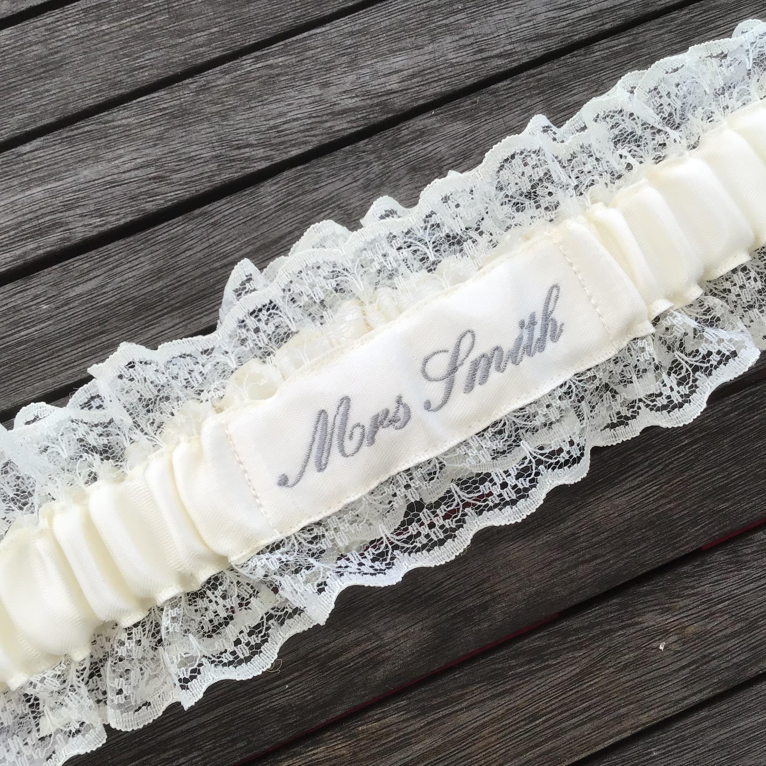 Embroidered personalised garter in white, bridal white or Ivory with a choice of embroidery thread colour.