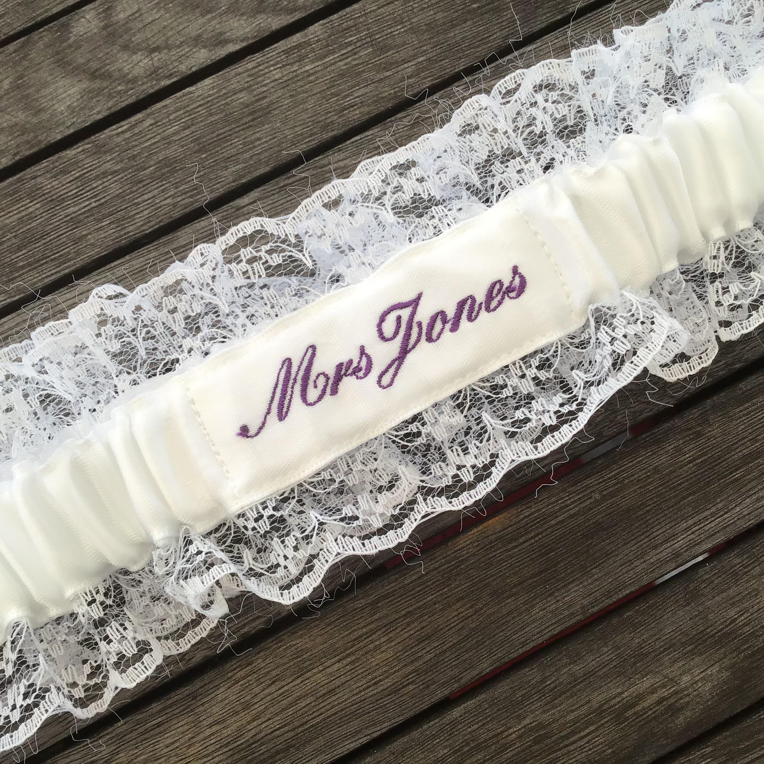 Embroidered personalised garter in white, bridal white or Ivory with a choice of embroidery thread colour.
