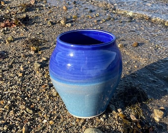 Ceramic vase glazed in shades of blue.