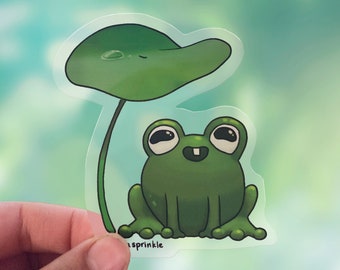 Sticker transparent grenouille sous un nénuphar
