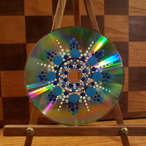 Circular Pointillism Dot Art in Shades of Blue on a CD