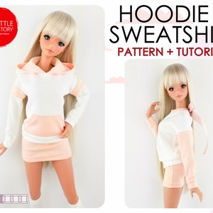 May include: A pattern and tutorial for making a hoodie and sweatshirt for a doll. The image shows a doll wearing a white hoodie with a pink trim and a pink sweatshirt with white trim.