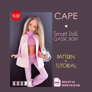 May include: A doll wearing a pink outfit, including a cape, turtleneck, crop top, and pants. The doll has long blonde hair and blue eyes. Text on the image reads "CAPE", "Smart Doll CLASSIC BODY", "PATTERN + TUTORIAL", and "DIGITAL DOWNLOAD".