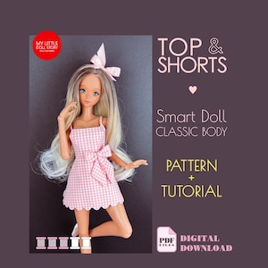 May include: A Smart Doll wearing a pink gingham dress with a bow. The doll has long blonde hair and is posed against a dark background. Text on the image reads "TOP & SHORTS", "Smart Doll CLASSIC BODY", "PATTERN + TUTORIAL", and "DIGITAL DOWNLOAD".
