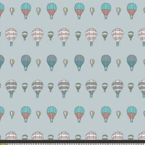 May include: A seamless pattern featuring a repeating design of hot air balloons in various colors, including blue, green, and pink, on a light blue background.