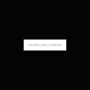 May include: A white rectangle with the text "THE GREY FINCH COMPANY" in black.