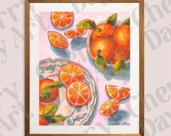 May include: A framed art print featuring a still life of oranges. The painting depicts whole and sliced oranges, some with green leaves, arranged on a plate and in a bowl. The background is a soft pink.