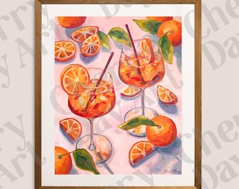 May include: A framed art print featuring two cocktails in stemmed glasses, garnished with orange slices and straws. Oranges and orange slices are scattered around the glasses, with green leaves on a pink background. The artwork is signed in the bottom right corner.