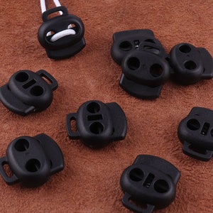 Spring Cord Lock,Black Plastic Cord Stopper,20*23mm Double Hole Rope End Toggle Clip Buckle,Sportswear Clothing mask cord adjustment