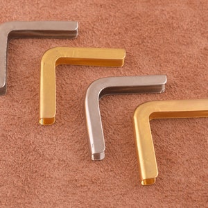 20pcs afgeronde hoek hoeken 24 * 3mm / zilver of goud metaal / bescherming hoeken, Silver Corners metalen bescherming portemonnee-Making tas tas koppeling
