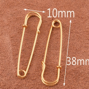 38 * 10mm Pines de seguridad 50pcs oro / negro encantador chal pines metal pines de seguridad broche Pines de seguridad pequeños pasadores de seguridad de costura Suministro