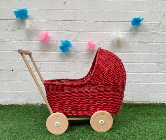 red dolls pram