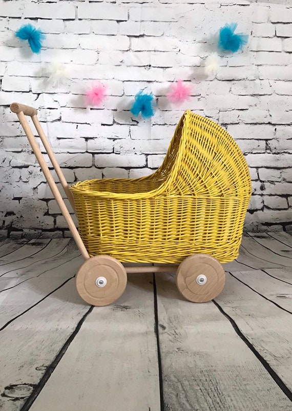 yellow dolls pram