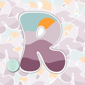 May include: A sticker featuring a stylised letter R with a sunset and mountain landscape design. The letter is a light purple colour with a light blue sky and an orange sun. The sticker is perfect for adding a touch of whimsy to laptops, water bottles, or journals.