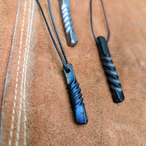 Forged, twisted necklace pendants