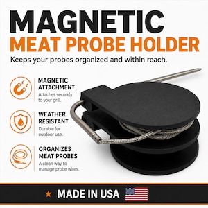 May include: A black circular magnetic meat probe holder with a metal probe and wire wrapped around the center. Text reads: MAGNETIC MEAT PROBE HOLDER, Keeps your probes organized and within reach, MAGNETIC ATTACHMENT, WEATHER RESISTANT, ORGANIZES MEAT PROBES, MADE IN USA.
