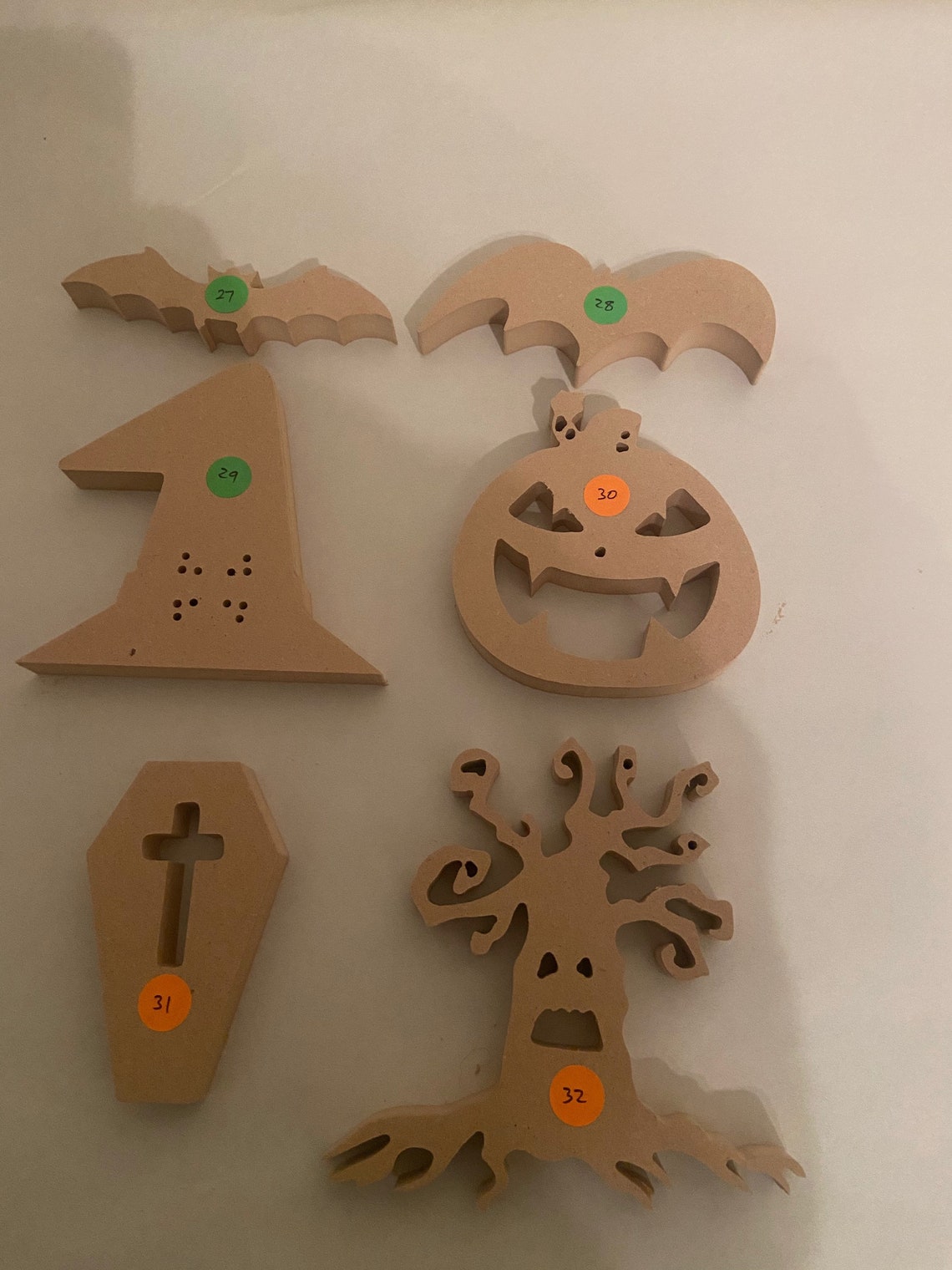 5.Whispers From The Beyond: Ghost Wood Cutouts