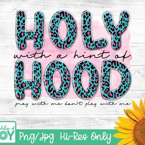May include: A digital design featuring the words "HOLY with a hint of HOOD" in turquoise and pink leopard print letters. The text is on a pink watercolor background with the words "pray with me don't play with me" below.