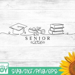 May include: A black and white line drawing of graduation-themed elements. The image includes a graduation cap, diploma, and books, with the text "SENIOR 2026". The image is on a white wooden background.
