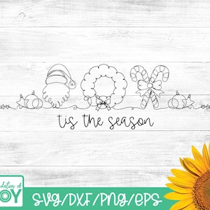 May include: Black line art design featuring Christmas-themed elements: Santa's hat and beard, a wreath, candy canes, and ornaments. The phrase "tis the season" is written below the illustrations. The design is on a white wooden background.