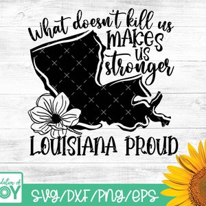 May include: Black and white graphic design featuring the outline of the state of Louisiana with a magnolia flower and the text "What doesn't kill us makes us stronger Louisiana Proud".