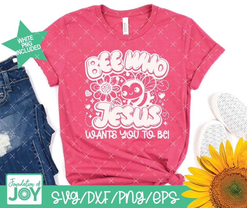 May include: Pink t-shirt with a white graphic design that says "Bee Who Jesus Wants You To Be!" with a bee and flowers.
