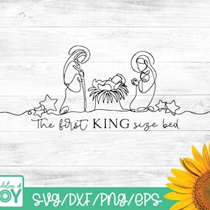 May include: A black line drawing of the Nativity scene, including Mary, Joseph, and baby Jesus in a manger, with stars and the text "The first KING size bed" on a white wood background. The image also includes the text "Foundation of JOY SVG/DXF/PNG/EPS".
