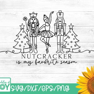 May include: Black and white line art of a Nutcracker theme. The design includes two Nutcracker figures, a ballerina, and two Christmas trees. The text reads "Nutcracker is my favorite season".