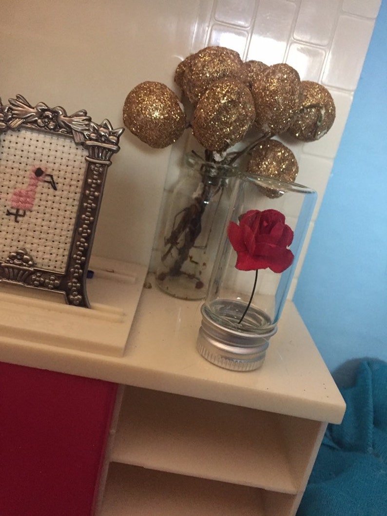 Miniature rose in a bottle