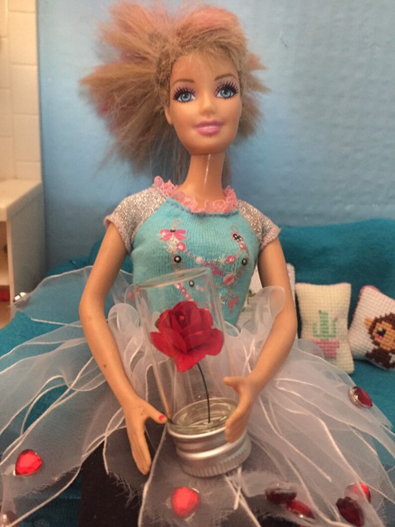 Miniature rose in a bottle