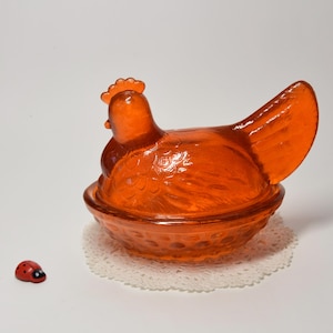 Glazen snoeppot / boterkip / glazen pot / decoratieve container / geperst glas / 11,5 x 8,5 x 10 cm / jaren 60 / Mid Century / Vintage / oranje