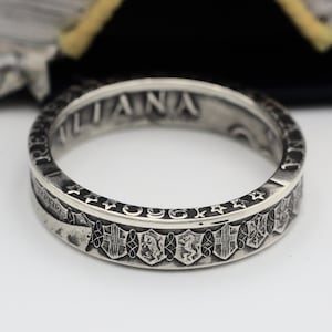 Italian coin ring made from a silver coin in the UK. Featuring shields from the different cities in Italy.