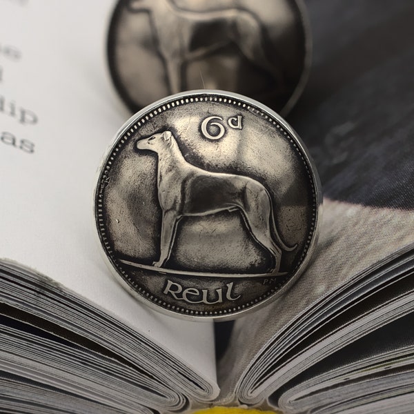 Coin cufflinks made from a Irish sixpence in the UK. Showing iconic symbols of Ireland: the Irish wolfhound or Gaelic harp.