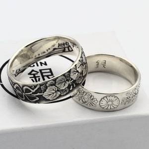 Japanese coin ring made from a silver coin in the UK. Perfect for an engagement ring. Made from a 100 year old heirloom 50 sen coin.