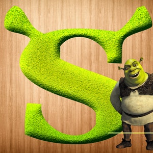 May include: A green, textured letter S with a cartoon ogre character standing to the right of the letter. The ogre is wearing a brown vest and pants, and has a green face with a big smile.