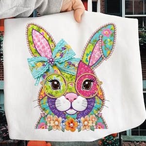 May include: A set of three ceramic mugs with a speckled, matte finish. The mugs are in shades of cream, light gray, and dark gray. Each mug has a simple, minimalist design, perfect for coffee or tea.