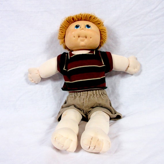 brown haired cabbage patch doll boy