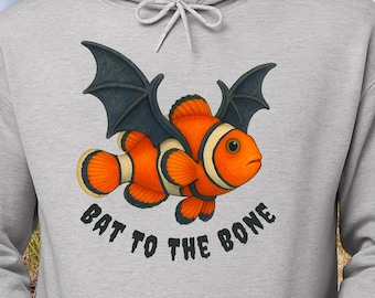 Bat to the Bone Clownfish Hoodie: Funny Coastal Halloween Sweatshirt with Bat Wings Design