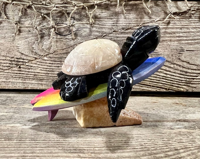 Handcrafted Marble Surfing Black Sea Turtle with Beige Shell Riding Rainbow Surfboard Tabletop Figurine