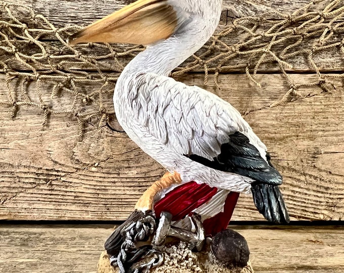 Hand-Painted Resin Coastal Pelican Perched On Boat Wreck with Seashell, Rope and Anchor Figurine